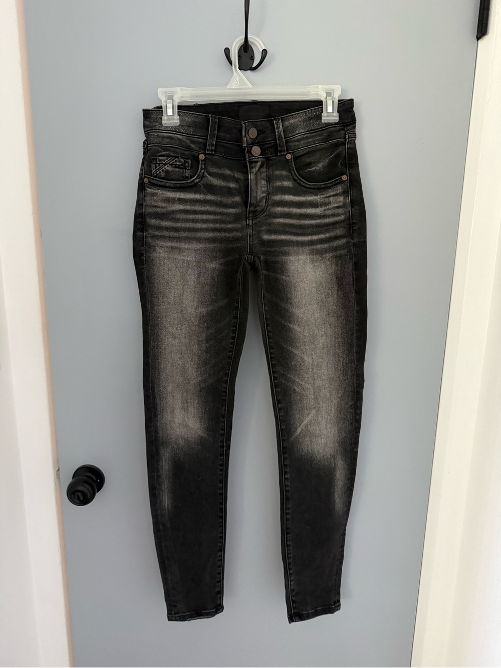 Buckle High-Rise Washed Black Skinny Jeans